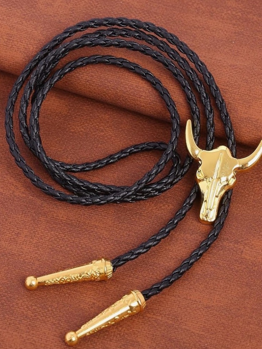 Amazon Black Braided Leather Bolo Tie with Gold Bull Skull